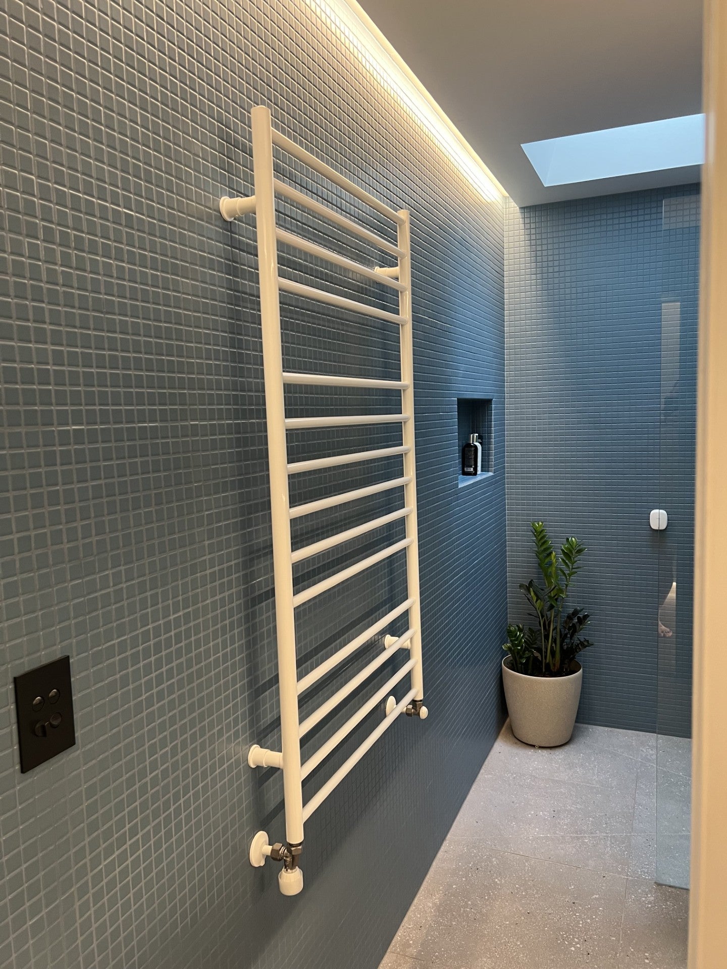 Iconic hydronic heated towel rail